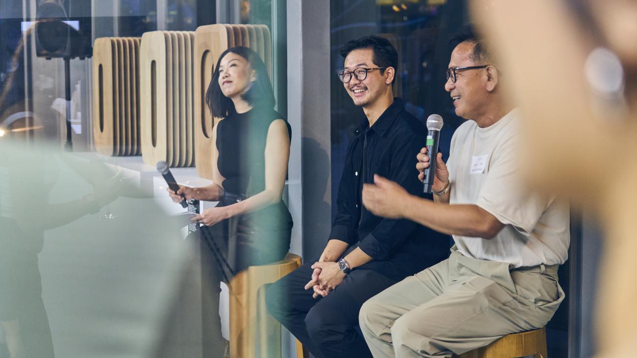 Yong, Tan and Seow in discussion